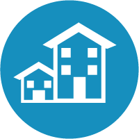 White icon of two houses, one larger and one smaller, with windows and doors, on a blue circular background.
